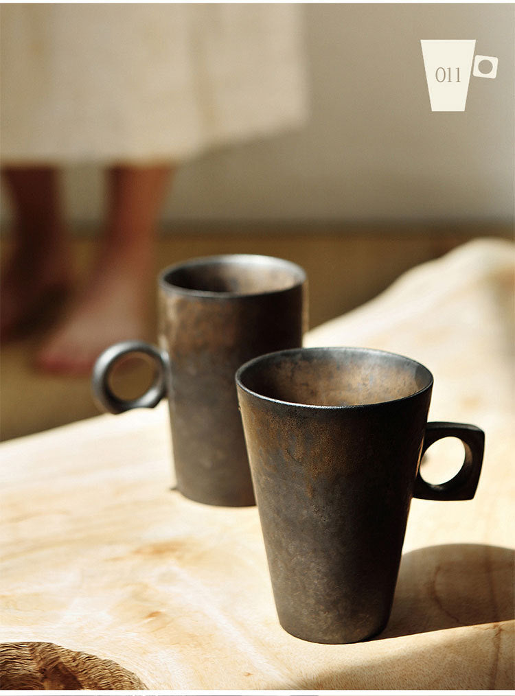 Gilt glazed ceramic tea cup