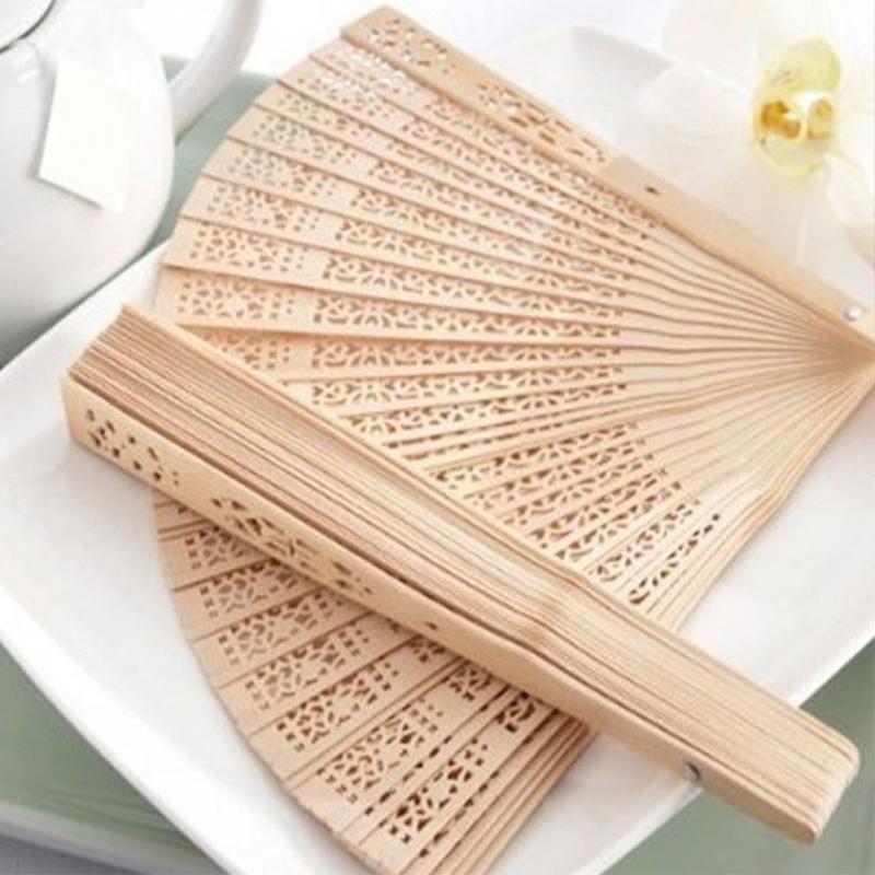 Traditional wooden fan with wood lace