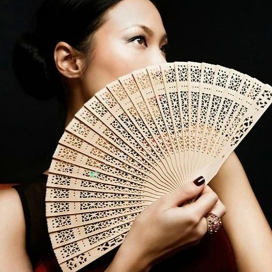 Traditional wooden fan with wood lace